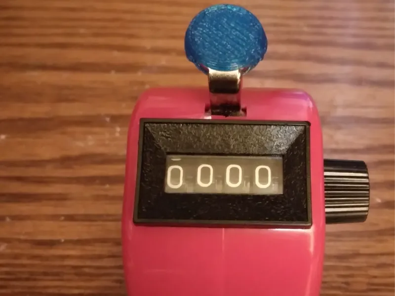 Button grip for a tally counter