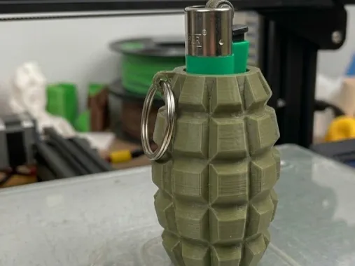 Custodia per accendino Clipper a forma di granata