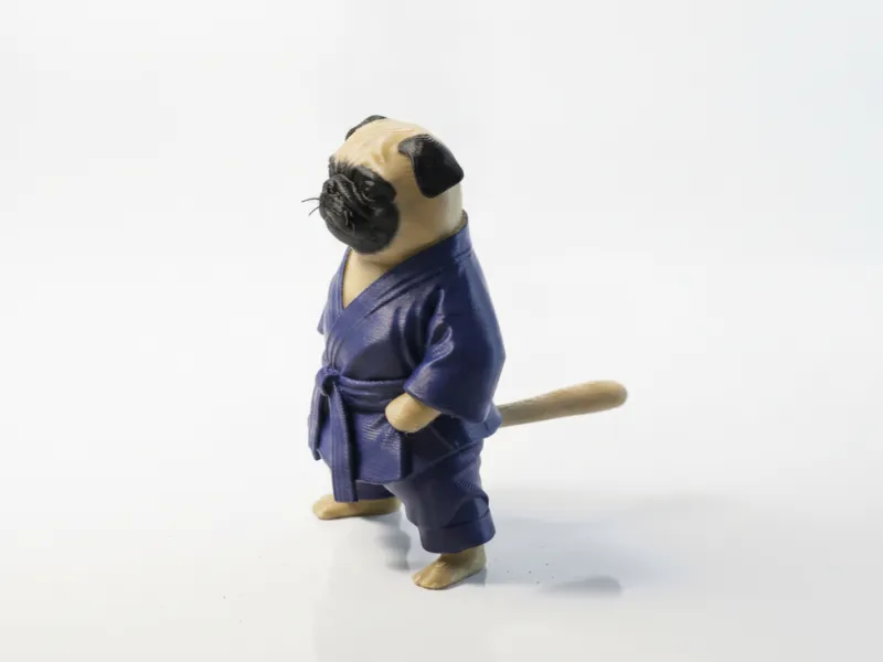 Figurine de chien en arts martiaux imprimable en 3D