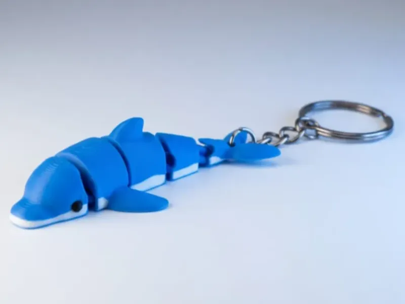 Schattige Flexi Dolfijn Sleutelhanger