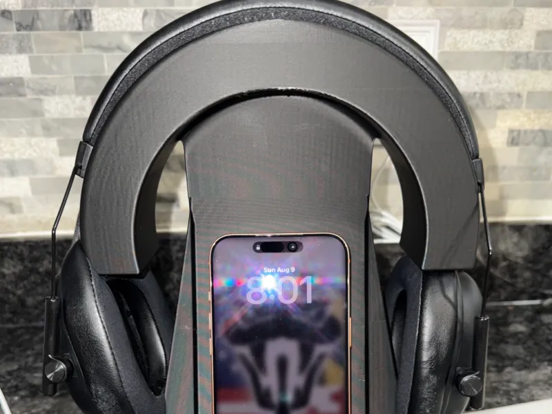 Support de casque avec chargeur de téléphone sans fil intégré