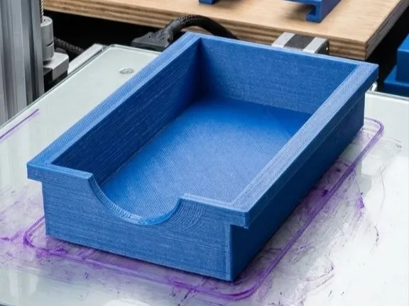 Under-Slide v2, een lade onder het bureau
