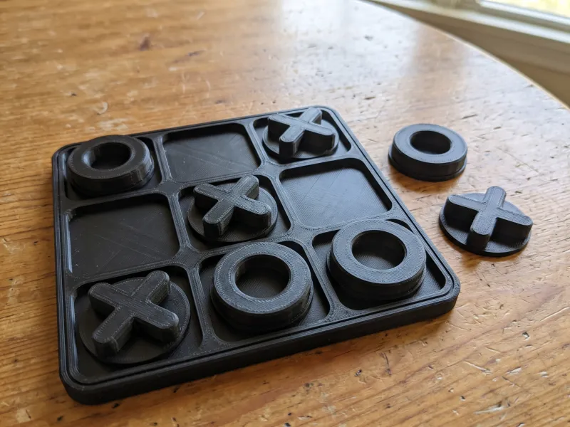 Tic Tac Toe Game, Board with 10 Pieces on One Plate