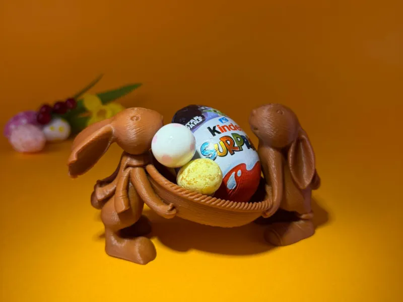 Coelhos com uma cesta de doces