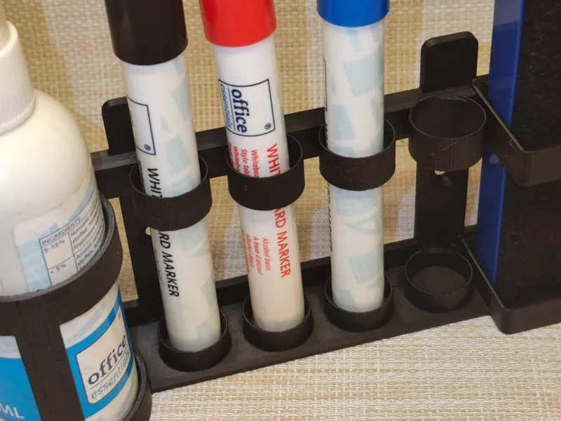 Stand, marker holder, 4 markers, sponge and liquids.