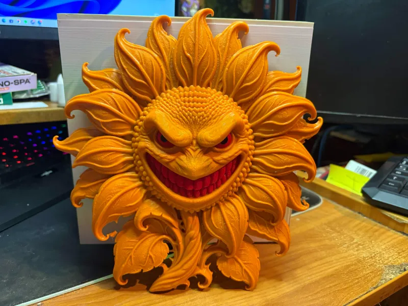 De Grijnzende Zonnebloem