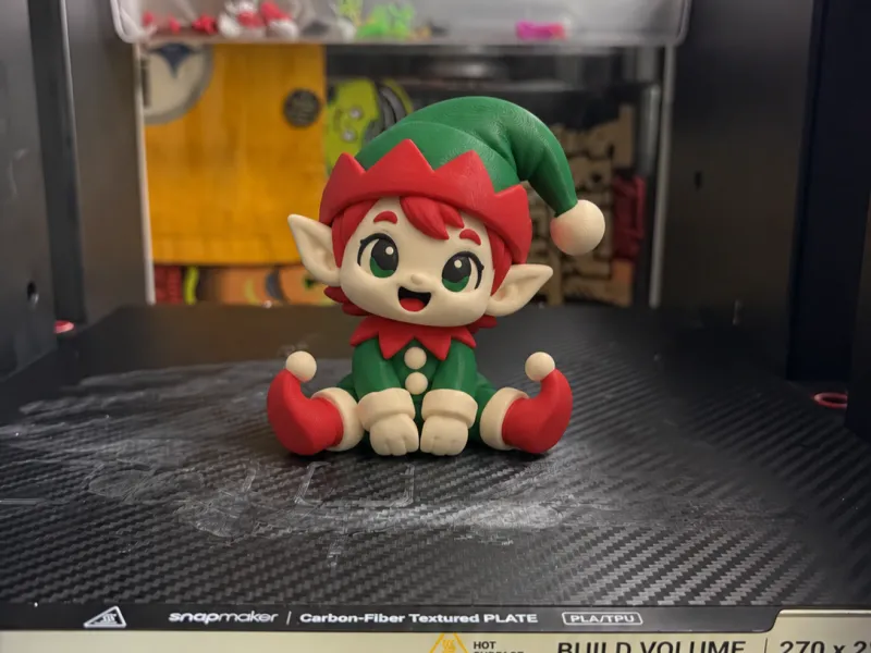 Jovie, o Pequeno Elfo Alegre - Companheiro de Mesa de Natal