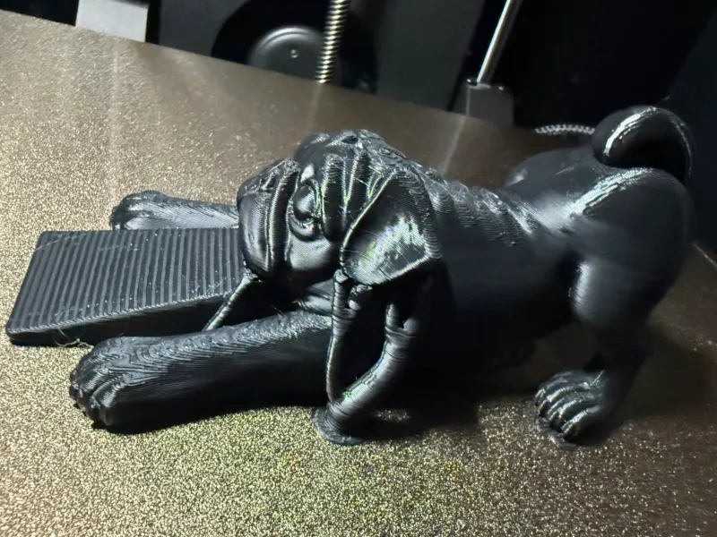 黒いパグのドアストッパー