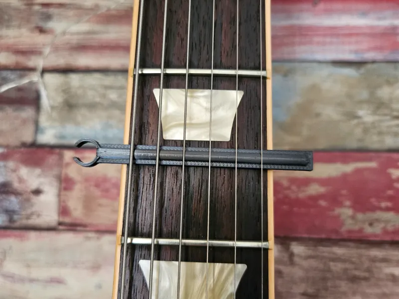 capotasto chitarra basso innovativo