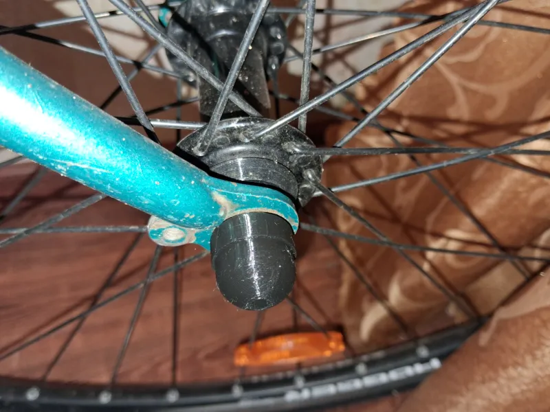 Protective Cap for Bicycle Wheel Hub Nut.