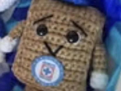 Meshy_AI_Captain Crumb Pacifier costalito cruz azul