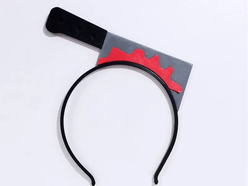 HeadBand with Cleaver Stuck in Head