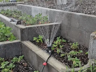 Garden sprinkler with flow control