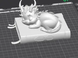 Sleeping Baby Dragon On A Book