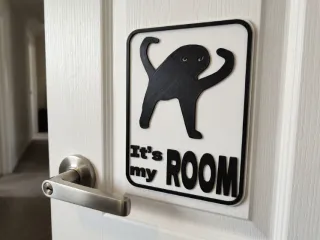 Cursed cat meme door sign