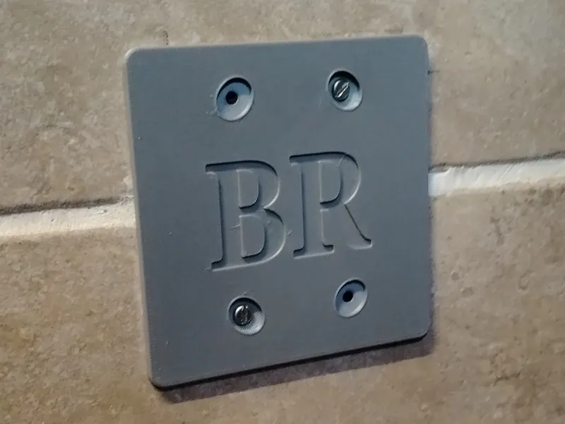 Cubierta para toma de corriente