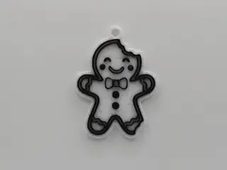 The Bitten Gingerbread Man Keychain