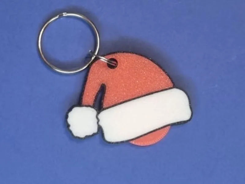 Portachiavi cappello babbo natale con gettone