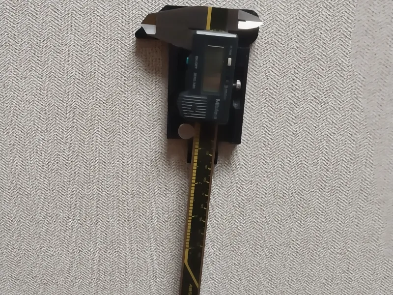 Magnetic caliper wall mount