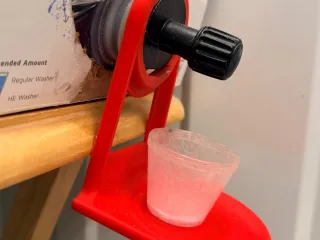 Detergent cup hanger