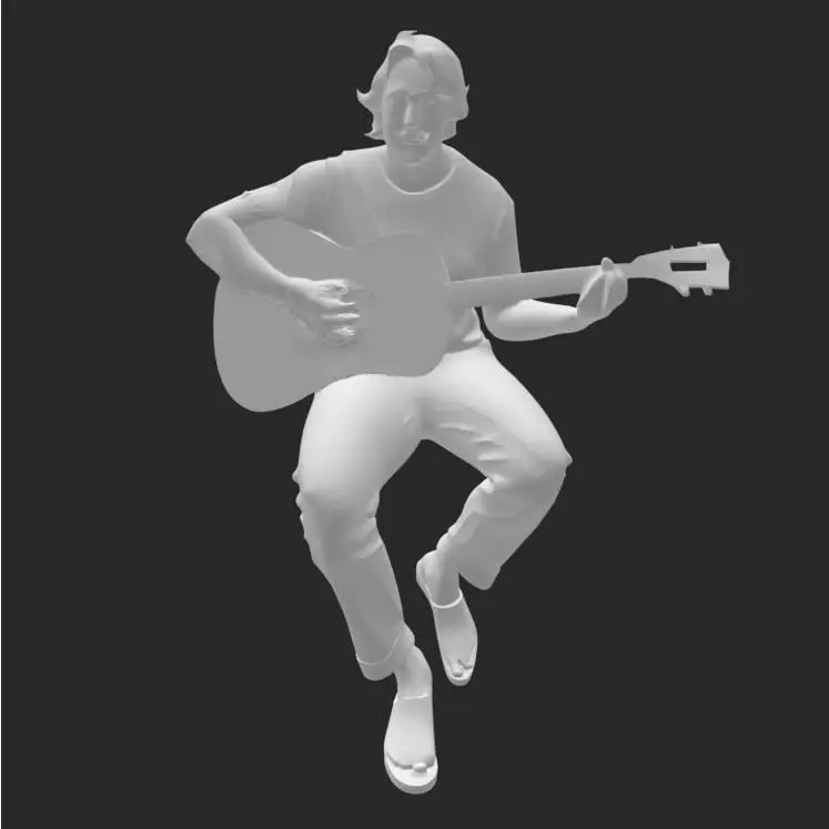 Man sitting playing guitar