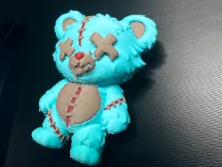 Creepy stitched teddy bear model