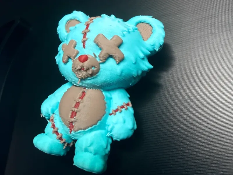 Creepy stitched teddy bear model