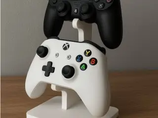 holding two gaming controllers