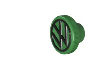 VW radio knob with raised logo