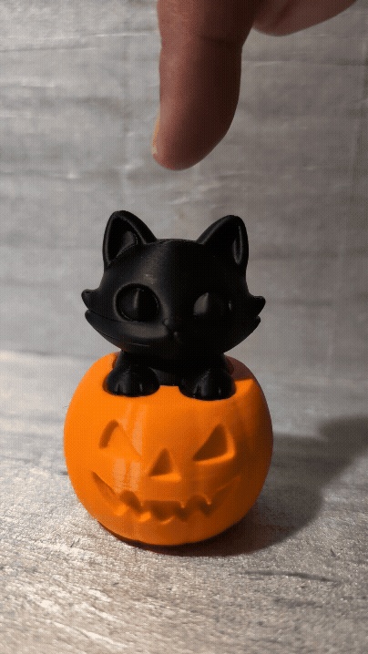 Gato em uma Abóbora de Halloween Clicker