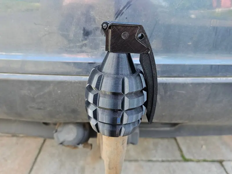 Hand grenade trailer hitch cover commercial license