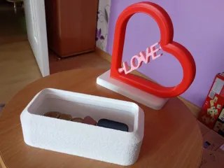 Heart with rotating LOVE text inside and secret compartiment
