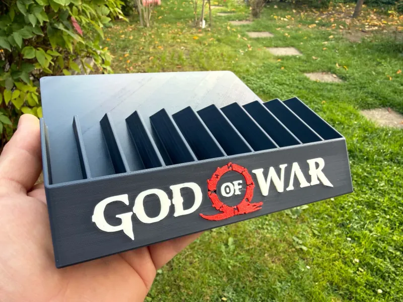 حامل ألعاب God of War لجهاز PlayStation 2–5 (PS2–PS5)