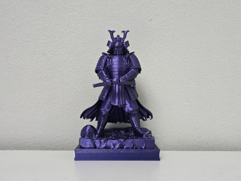 Purple Silk Samurai Warrior on Rock