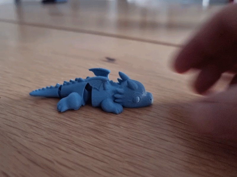 Articulated flexi dragon print in place