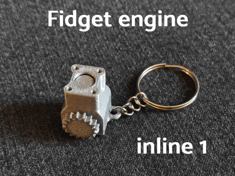Fidget motor in lijn 1 sleutelhanger - geen supports