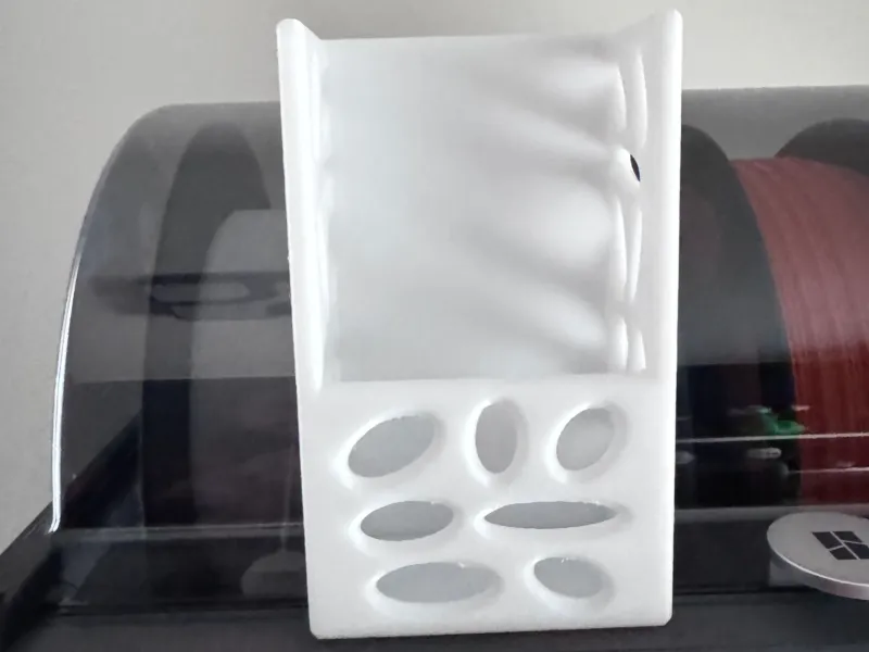 Support de télécommande moderne au design ovale