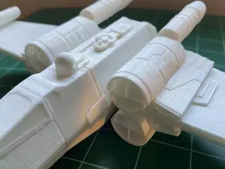 X-wing with foldable wings and R2-D2 button.