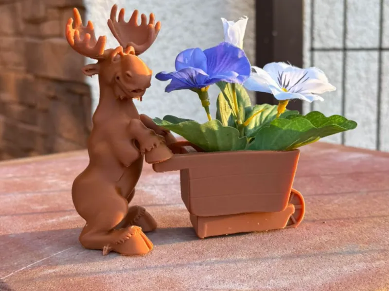 Moose with a wheelbarrow