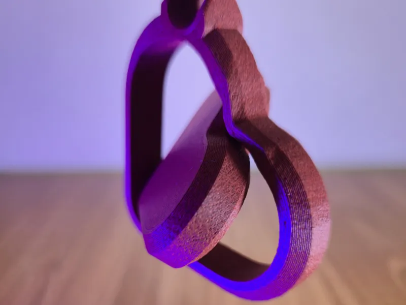Chaveiro Giratório de Coração – Fidget de Corações Entrelaçados