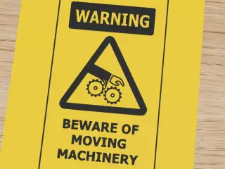 Warning sign: moving machinery hazard
