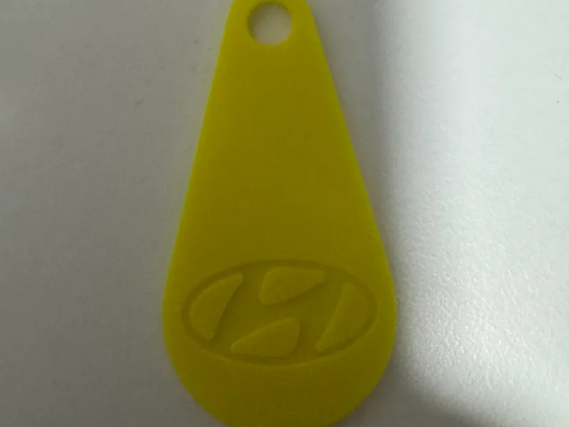 llavero supermercado hyundai logo
