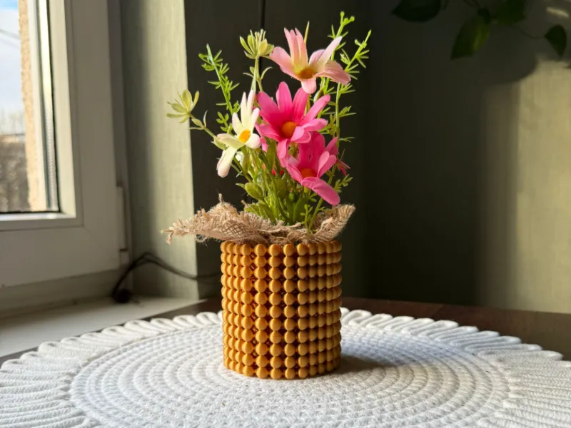 Golden beaded vase