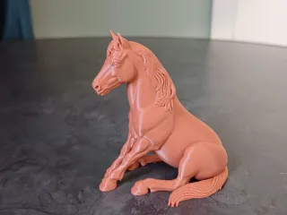 Realistic Sitting Horse Figurine