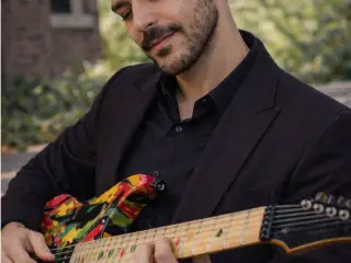 Me test playing guitar