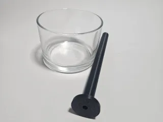 Fixador de pavio de vela