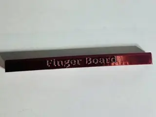 Finger Board Curb