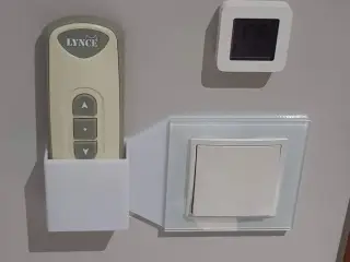 Remote Control holder attached to the light switch