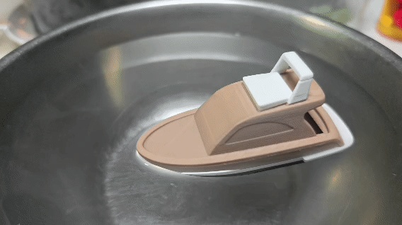 Juguete de baño: yate que flota en el agua