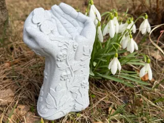 Garden sculpture ''Nature Held in Hands''